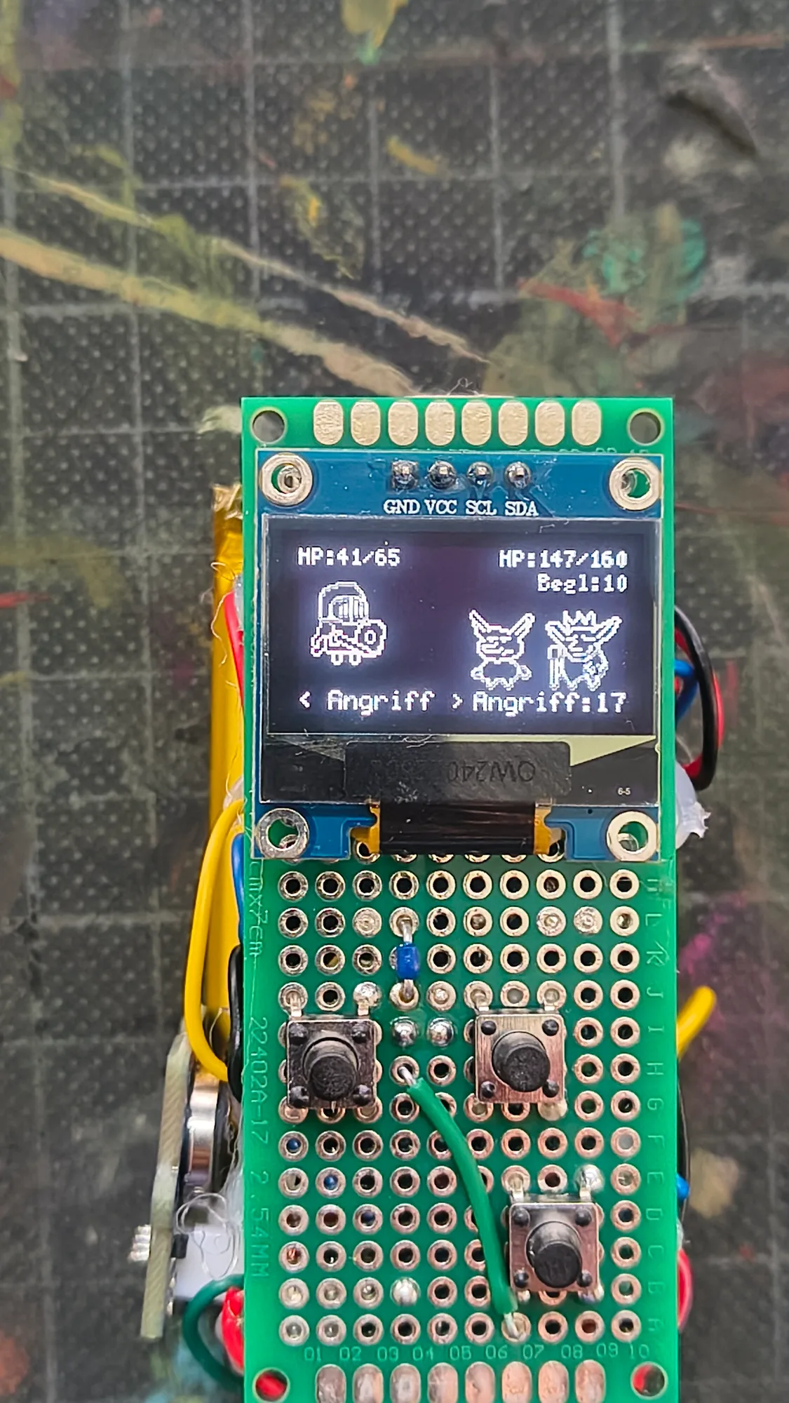Pocket Knight OLED display showing the battle screen